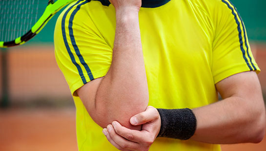 Tennis elbow treatment with chiropractic in Louisville